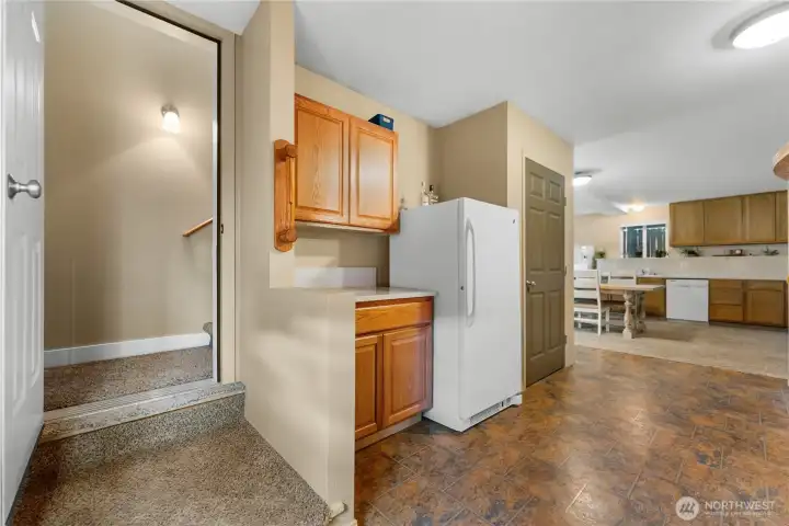 Entry into the basement from upstairs or there is a door to the right with direct access to outdoor patio and seating area.