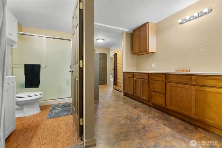 3rd Bathroom to the left, Pantry/Storage on the right