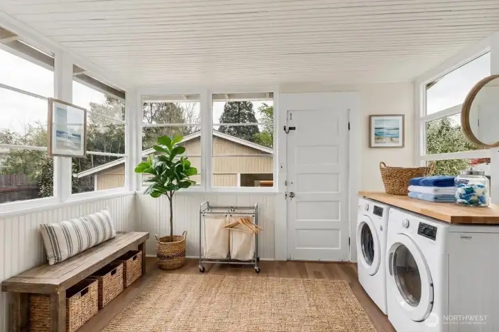 Main floor Sunroom & Laundry: virtually staged