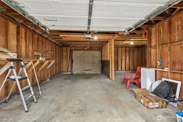 Garage with potential for drive thru to alley.