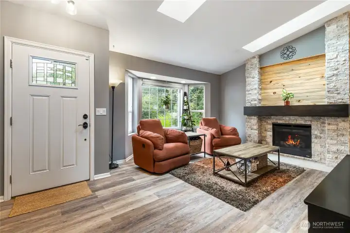 Cozy living room as you enter the home