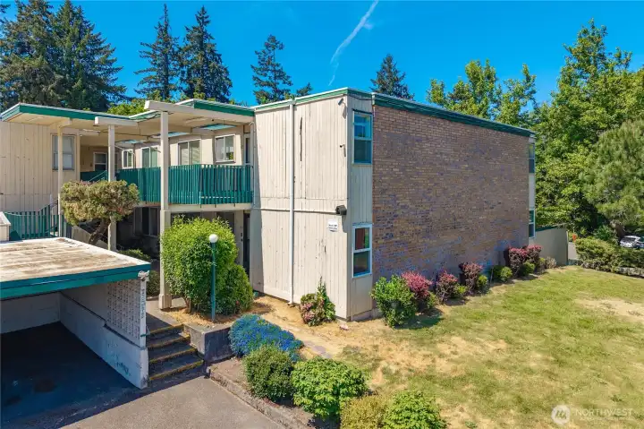 Ground floor, corner unit - closest to the carport.