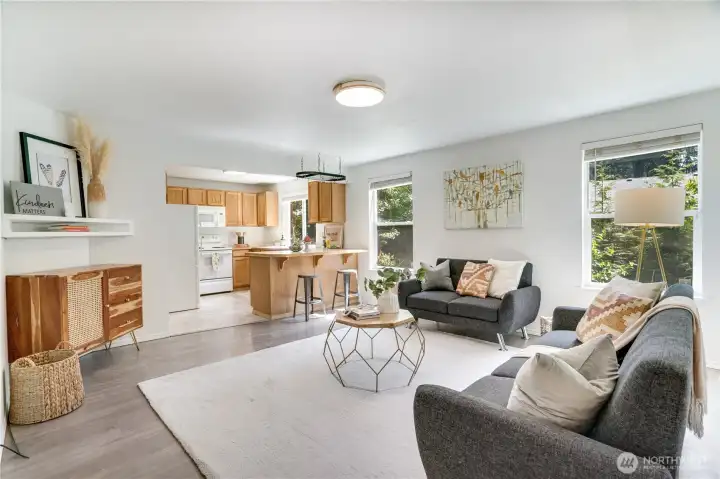 Along with a front living room, the main floor includes a family room open to the kitchen. Along with a front living room, the main floor includes a family room open to the kitchen.
