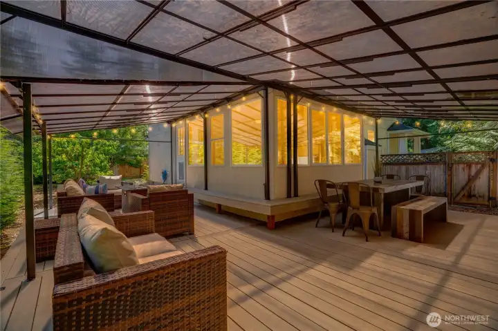 The wraparound deck is covered for use rain or shine. The wraparound deck is covered for use rain or shine.