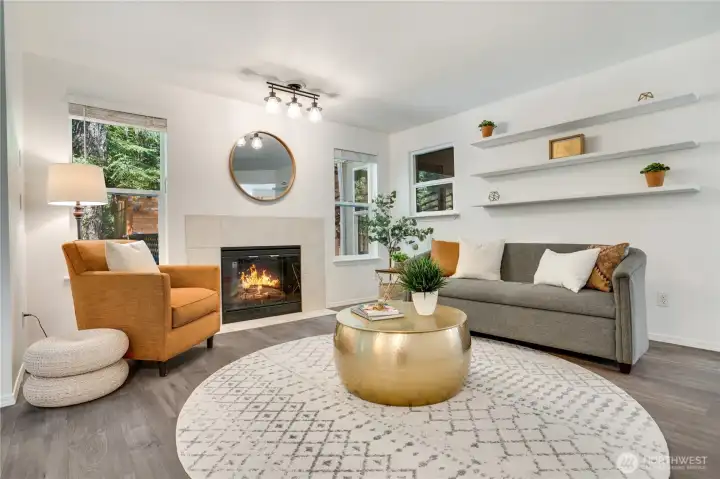 An entry leads into the front living room. Notice the fresh interior paint that you'll see throughout the home. An entry leads into the front living room. Notice the fresh interior paint that you'll see throughout the home.