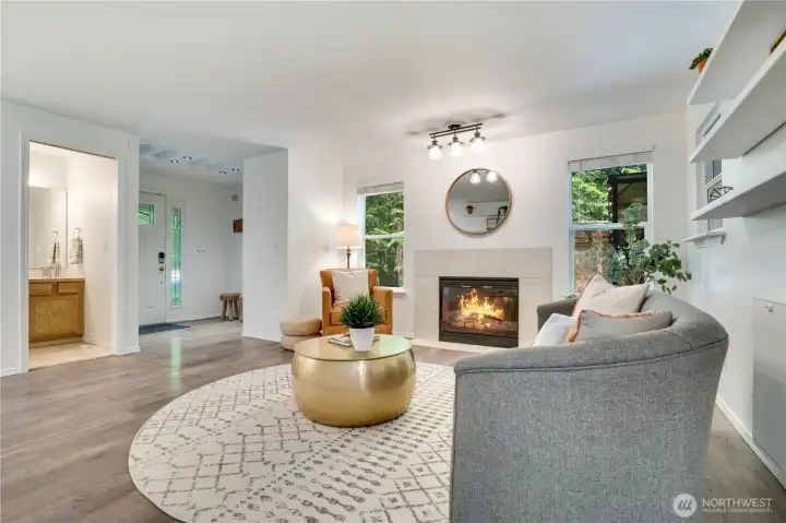 Hang your coat in the entry closet and find the convenient main floor 1/2 bath right inside the front door. Hang your coat in the entry closet and find the convenient main floor 1/2 bath right inside the front door.