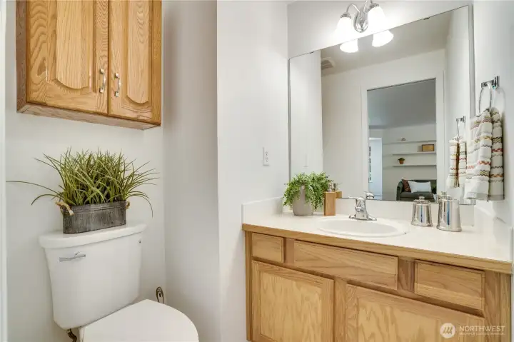 Follow the hall from the family room to enter the garage or to reach the 1/2 bath. Follow the hall from the family room to enter the garage or to reach the 1/2 bath.