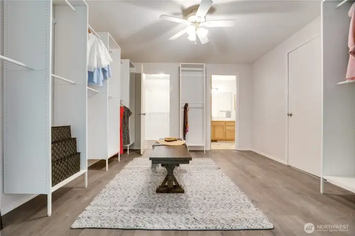 The dressing room opens to a walk-in closet and the private full bath. Take a door to the landing, or back into the primary bedroom. The dressing room opens to a walk-in closet and the private full bath. Take a door to the landing, or back into the primary bedroom.