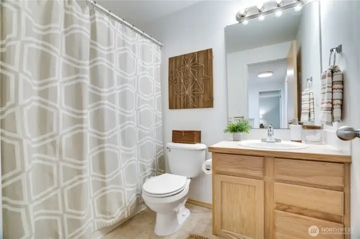 The full bath is easy to reach from the 2nd floor bedrooms with the linen closet right outside the door. The full bath is easy to reach from the 2nd floor bedrooms with the linen closet right outside the door.