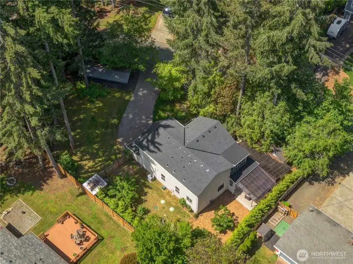 This 1,886 sq ft home (plus the 435 sq ft garage) is set on a 10,740 sq ft lot with a fenced back yard, lawn, wooded areas, garden sheds, a deck, hot tub, paved driveway, and additional parking. This 1,886 sq ft home (plus the 435 sq ft garage) is set on a 10,740 sq ft lot with a fenced back yard, lawn, wooded areas, garden sheds, a deck, hot tub, paved driveway, and additional parking.