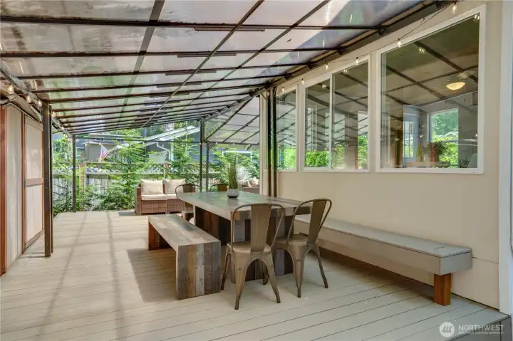 Built-in bench seating leaves plenty of space for outdoor dining and lounge furniture. Notice the garden shed on the left with room for yard tools. Built-in bench seating leaves plenty of space for outdoor dining and lounge furniture. Notice the garden shed on the left with room for yard tools.