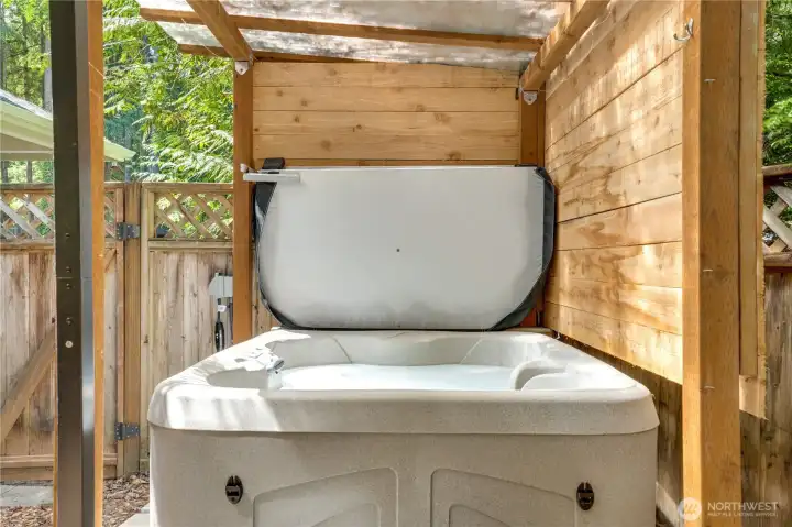 Leave your towels on the deck and relax in the private, covered hot tub. Leave your towels on the deck and relax in the private, covered hot tub.