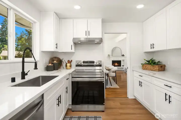 Brand new kitchen with new stove, hood, sink and faulcet, ready for you to enjoy! Brand new kitchen with new stove, hood, sink and faulcet, ready for you to enjoy!