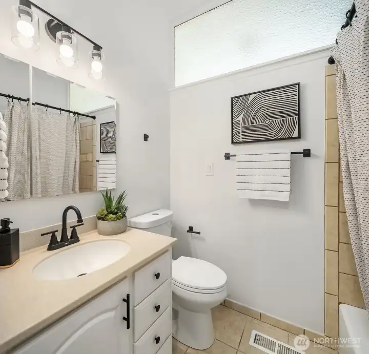 Hallway full bath with high ceiling. Hallway full bath with high ceiling.