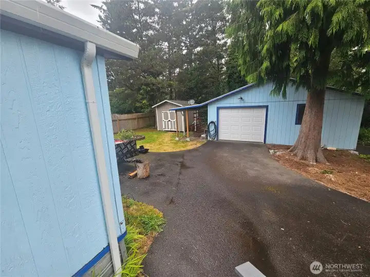 Storage shed, garage with shop area inside. Storage shed, garage with shop area inside.