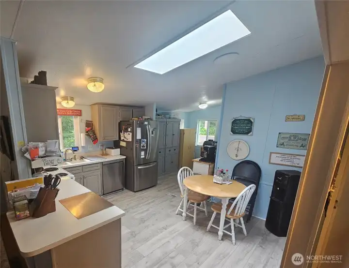 Kitchen and dining room combo. Kitchen and dining room combo.