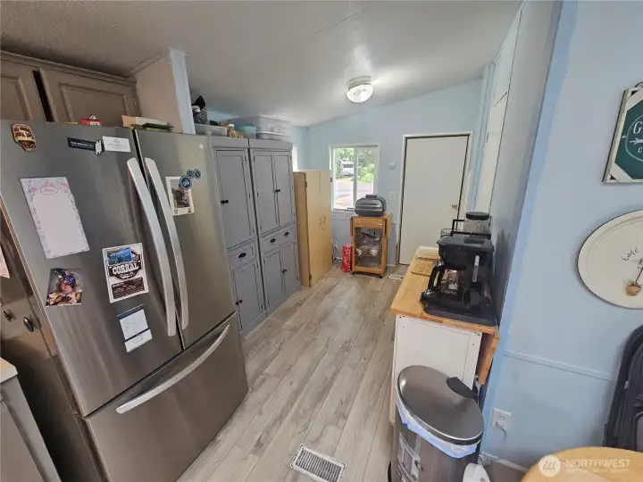 Leading to the front door and the utility room. Leading to the front door and the utility room.