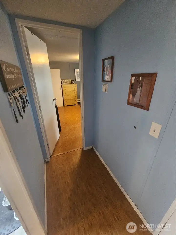 Hallway to the main bedroom. Hallway to the main bedroom.