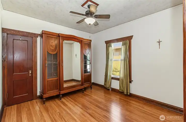 Ar'moire in bedroom can stay, real hardwood on floor