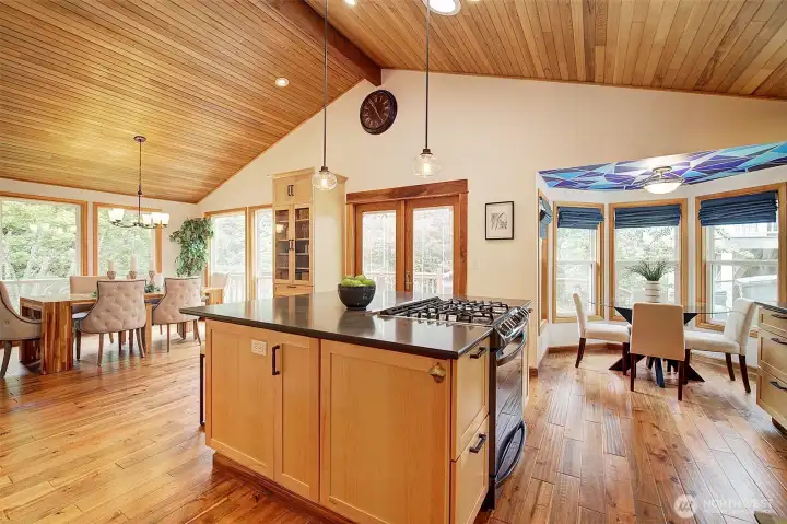 Stunning natural wood ceilings, wide plank floors and updated kitchen.
