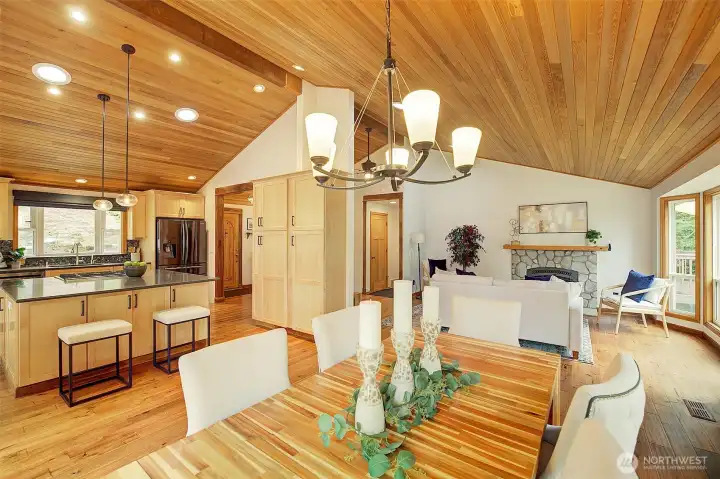 View of dining room, living room, kitchen.