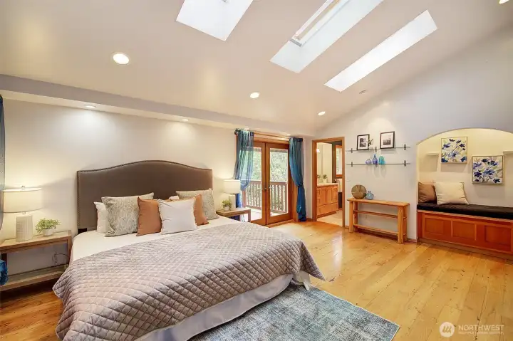 Primary with French doors to private deck.