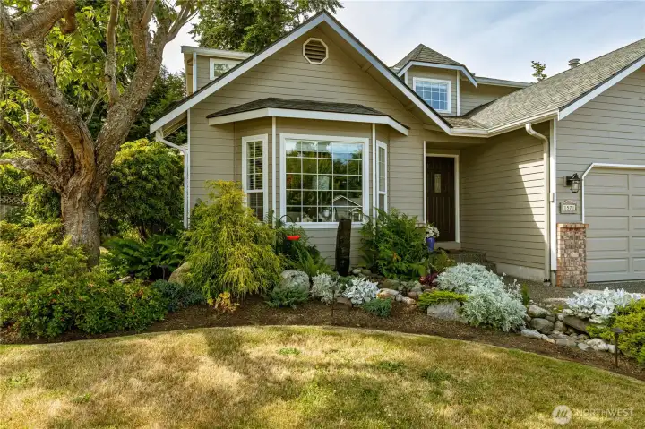 Inviting front entrance with water feature.