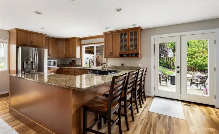 French doors lead to the back patio and outside entertaining area