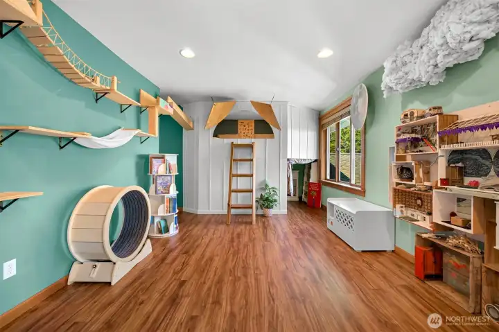 This bedroom has a loft bed and a trundle bed underneath the loft. This bedroom has a loft bed and a trundle bed underneath the loft.