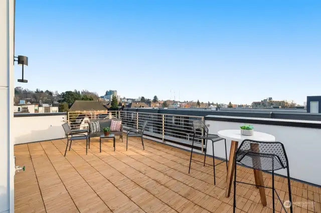 Expansive rooftop deck designed for entertaining and relaxation, with ample space for seating and enjoying the outdoors.