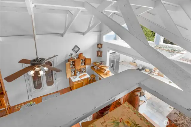 From the balcony of the next level looking over the Kitchen and family room.