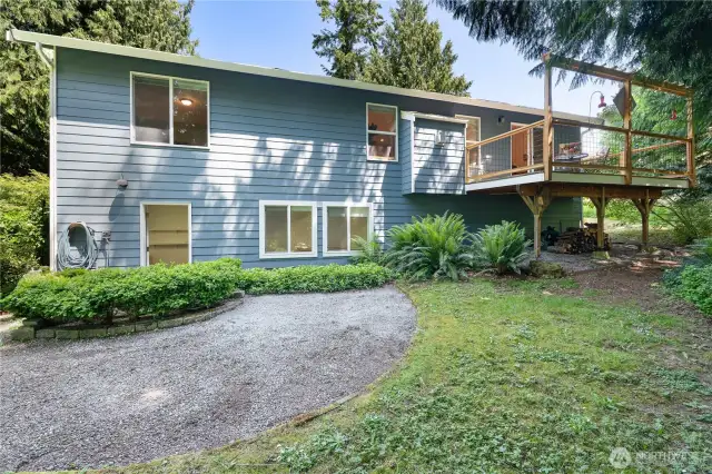 Backyard area, Showing Access to the lower level finished square footage.