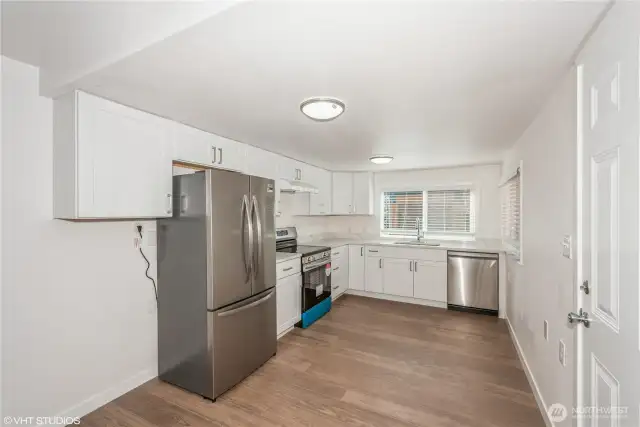 Modern kitchen equipped with stylish stainless steel appliances for a clean, contemporary look.