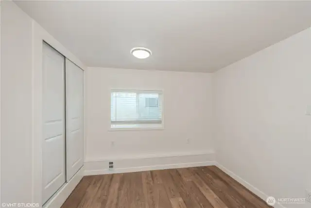 Comfortable second bedroom, perfect for guests, flex-space or a home office.