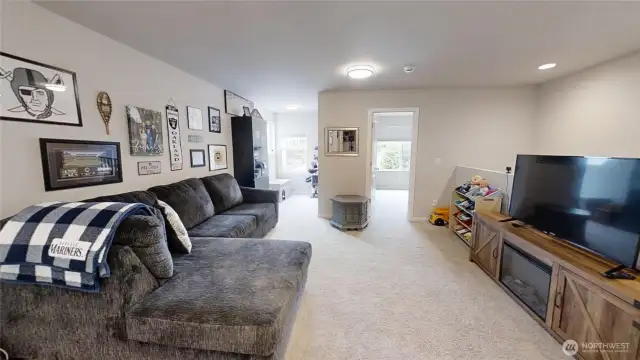 Huge upstairs loft area creates additional living space.