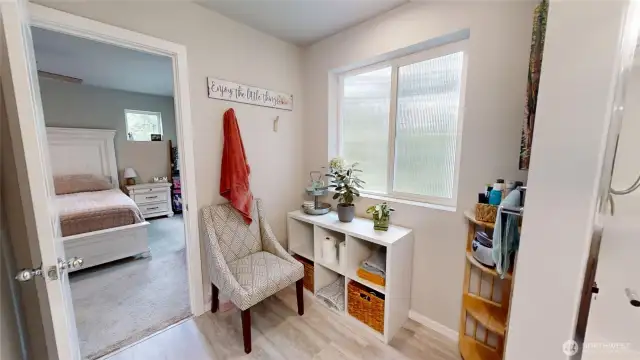 Large primary bathroom with plenty of space for storage.