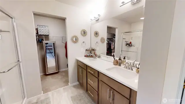 Primary bathroom with dual sinks.