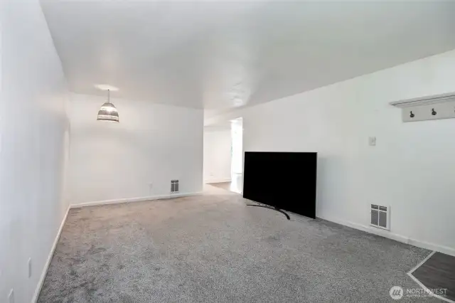 Living room with kitchen & Dining to the right past the T.V.