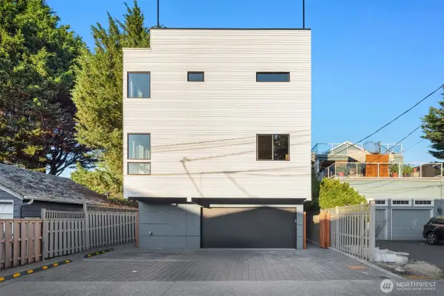 A dedicated off-street parking spot with EV conduit, accessed via the alley, adds convenience, while the fully fenced yard, professionally stained and sealed, provides safety and peace of mind for pets and people alike.