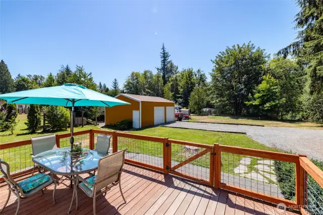 Step out the back door to the deck overlooking the property