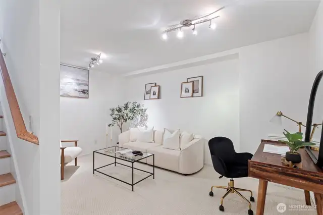 The lower level features a large bonus or media room.  A pleasant surprise to find a second living area in a townhome.
