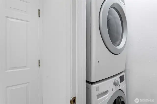 Full-sized newer stacked front-loading washer and dryer