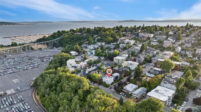 Drone shot of rooftop deck looking Southwest to Elliott Bay Marina, West Seattle and Puget Sound