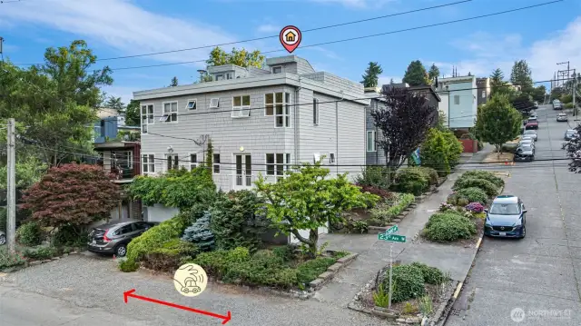 In addition to the large garage, there is extra off-street parking on the east side and plenty of street parking on the north side of this home.