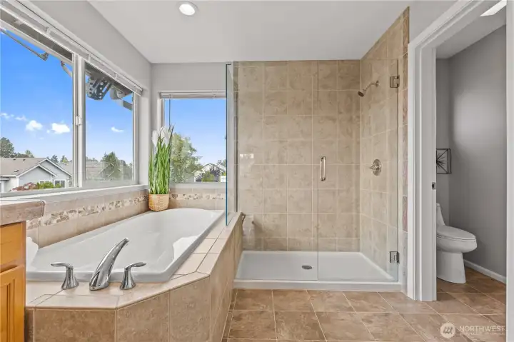Relaxing soaker tub and new custom shower.
