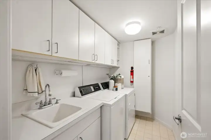 Laundry room with newer washer & dryer