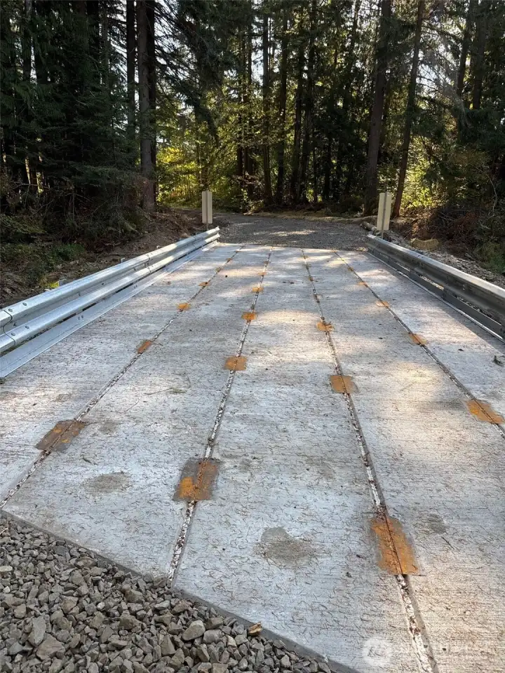 New Sturdy concrete bridge over Mineral Creek on this property