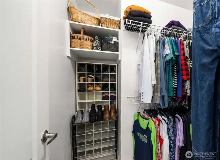 The walk-in closet provides generous storage and easy organization, keeping everything neatly in its place.
