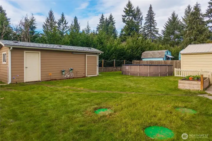 The spacious backyard offers room to relax and enjoy the outdoors, with the septic pumped and inspected and the County’s Time of Transfer completed for added peace of mind.