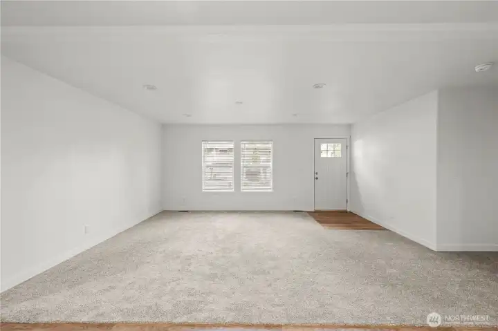 Large light filled living area with open kitchen concept